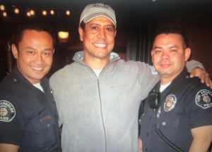 Kamel Krifa in the company of Los Angeles policemen